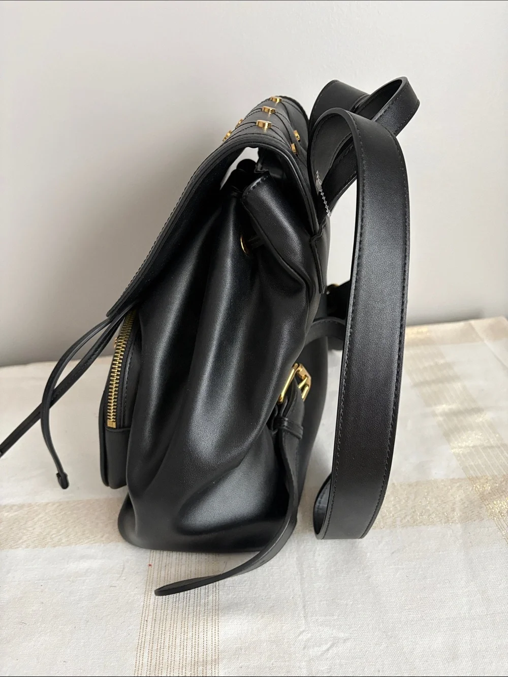 BNWOT Designer LOVE MOSCHINO Backpack, Faux Leather, with gold metal design.